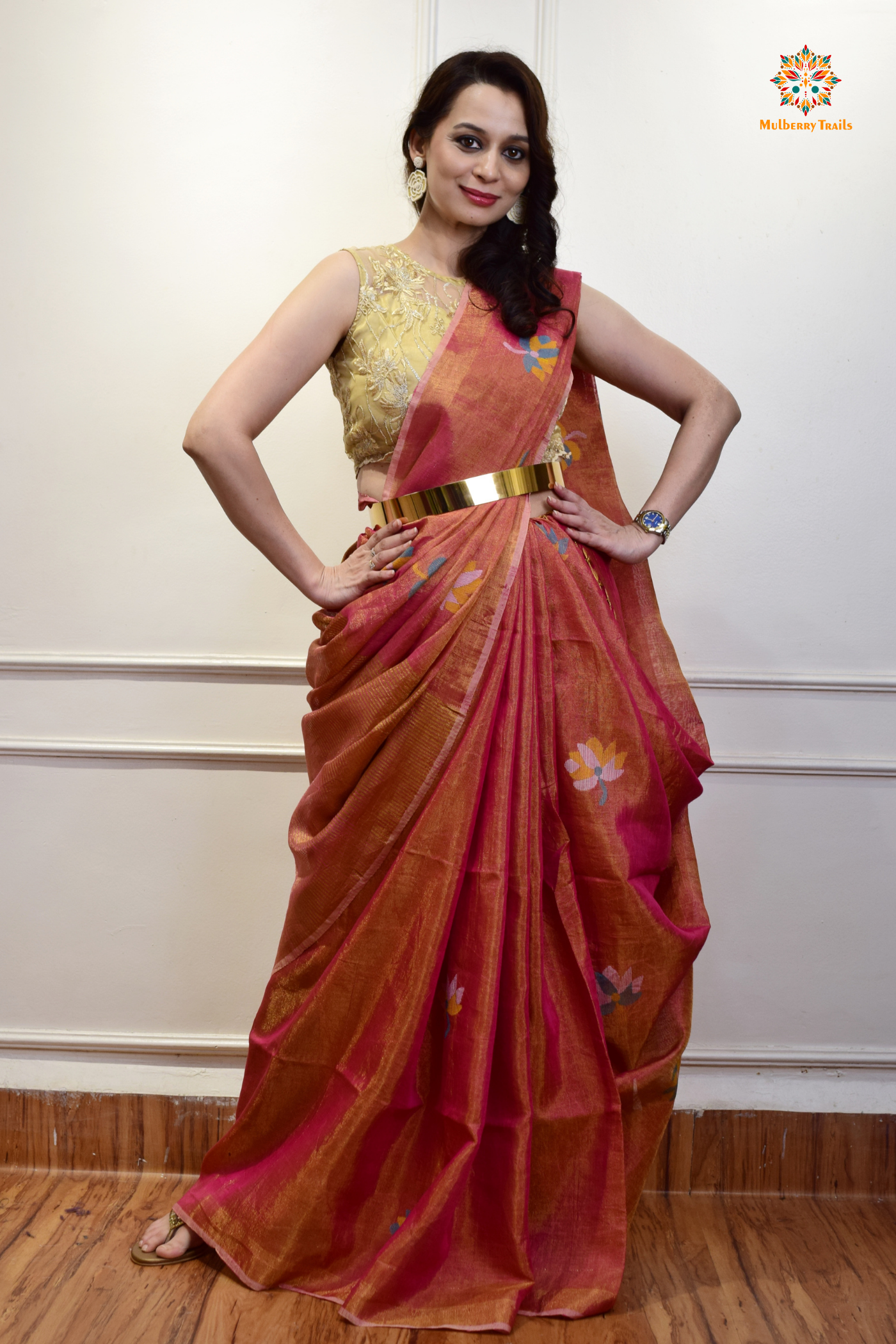 This image features an Elegant tissue saree featuring intricate handwoven Jamdani lotus motifs, with a lightweight, shimmery fabric that drapes beautifully, perfect for festive and special occasions. Party wear , diwali theme.