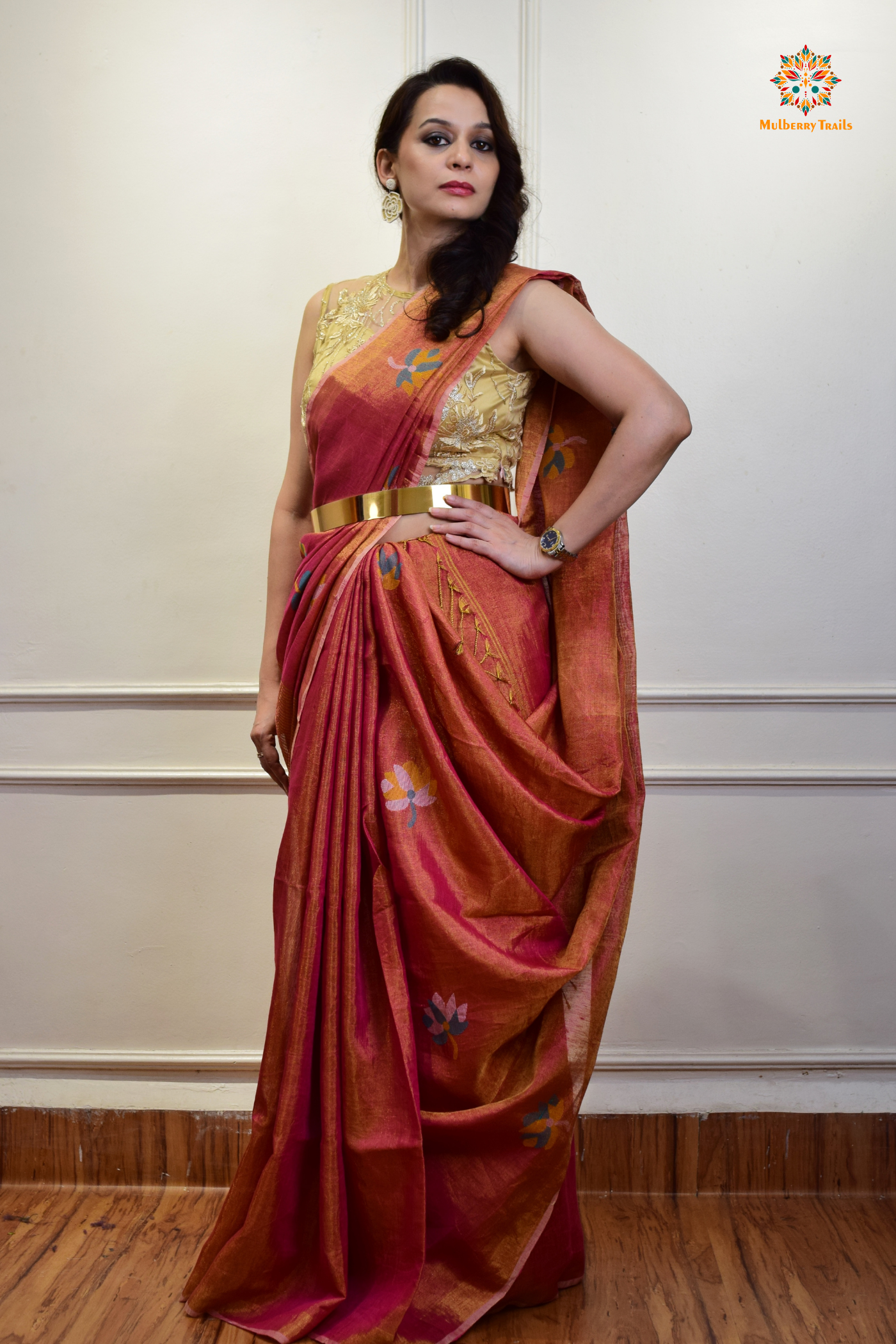 This image features an Elegant tissue saree featuring intricate handwoven Jamdani lotus motifs, with a lightweight, shimmery fabric that drapes beautifully, perfect for festive and special occasions. Party wear , diwali theme.