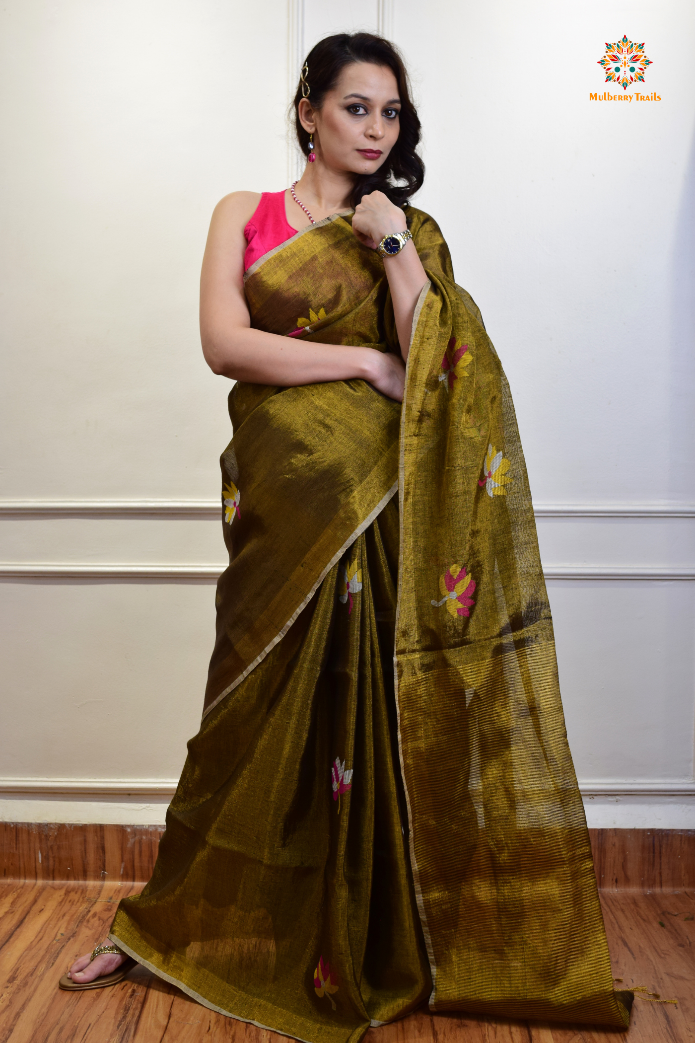 This image features an Elegant tissue saree featuring intricate handwoven Jamdani lotus motifs, with a lightweight, shimmery fabric that drapes beautifully, perfect for festive and special occasions. Party wear , diwali theme.