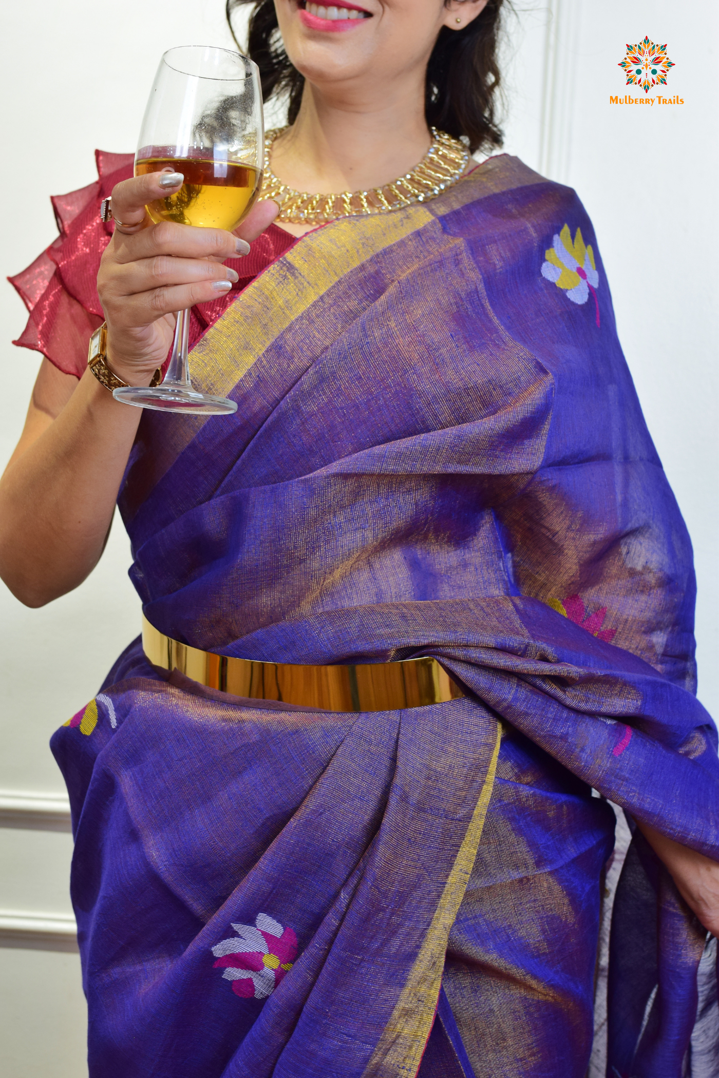 This image features an Elegant tissue saree featuring intricate handwoven Jamdani lotus motifs, with a lightweight, shimmery fabric that drapes beautifully, perfect for festive and special occasions. Party wear , diwali theme.