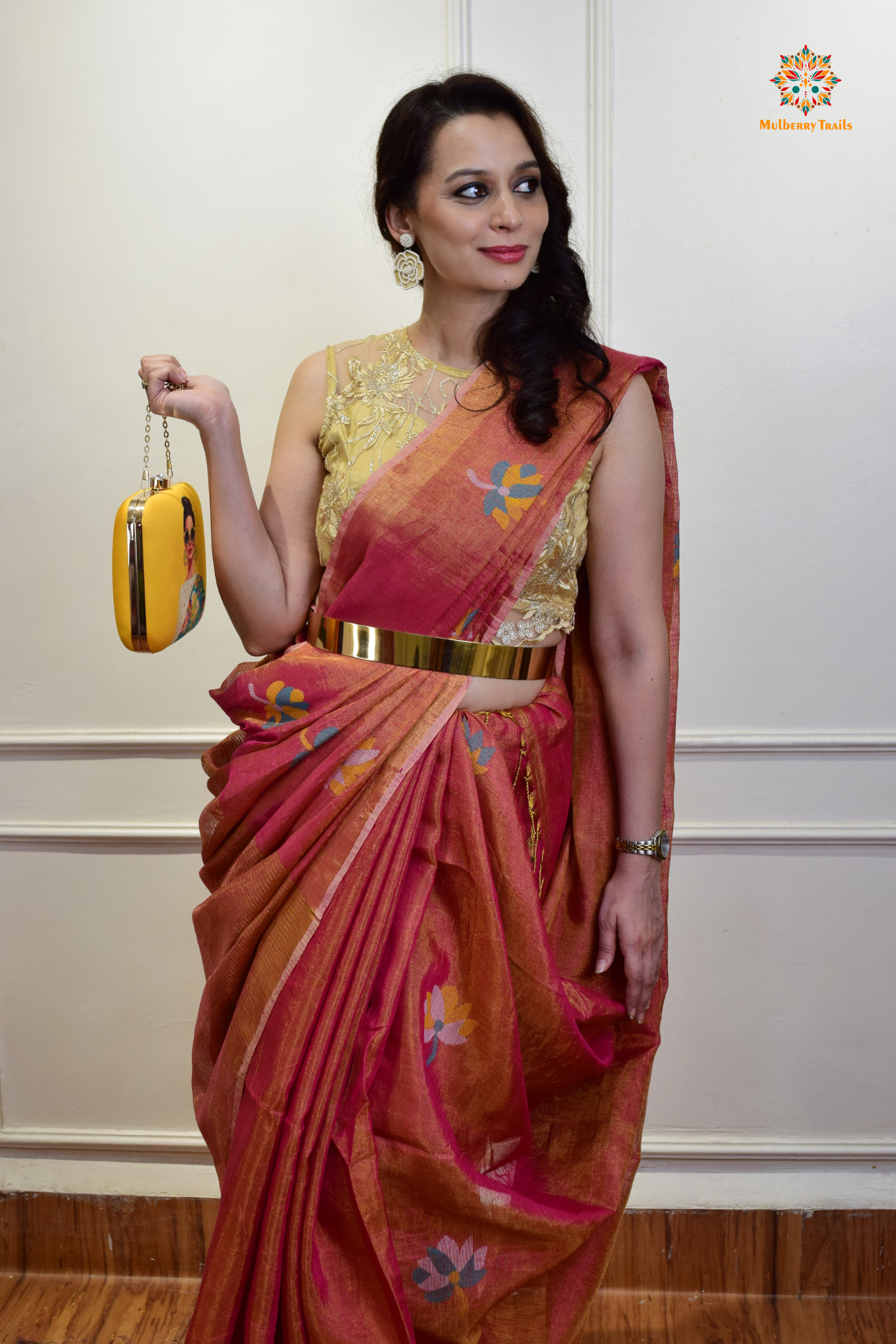 This image features an Elegant tissue saree featuring intricate handwoven Jamdani lotus motifs, with a lightweight, shimmery fabric that drapes beautifully, perfect for festive and special occasions. Party wear , diwali theme.