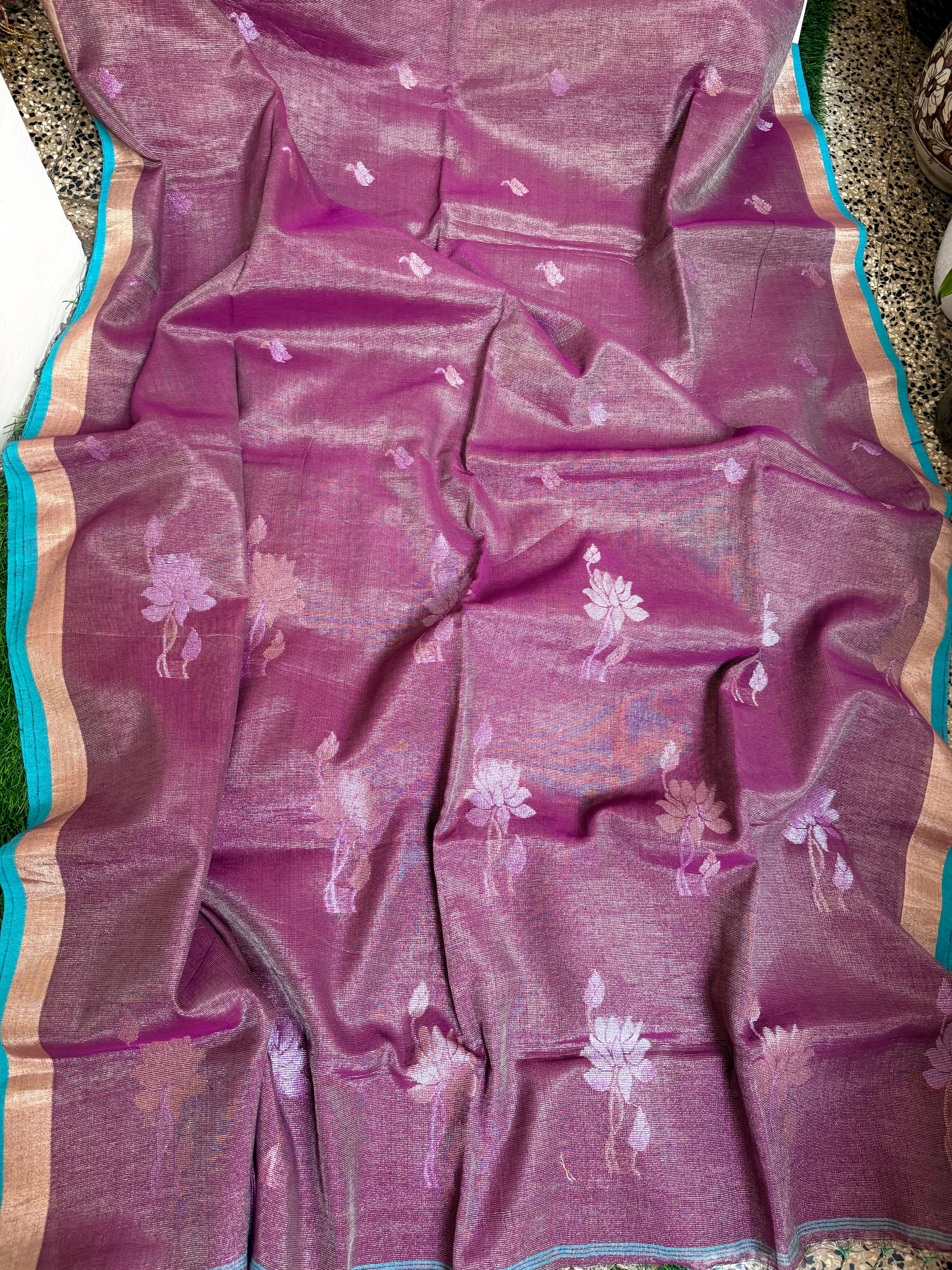 Linen tissue sarees with lotus motif