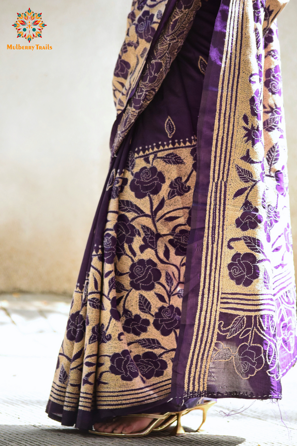 Art Silk saree with intricate Kantha embroidery featuring delicate floral and geometric patterns. The saree has a smooth, lightweight texture with vibrant threads that highlight the traditional hand-embroidery, adding a touch of elegance and cultural charm. Ideal for festive occasions, celebrations, or as a statement piece for special events.