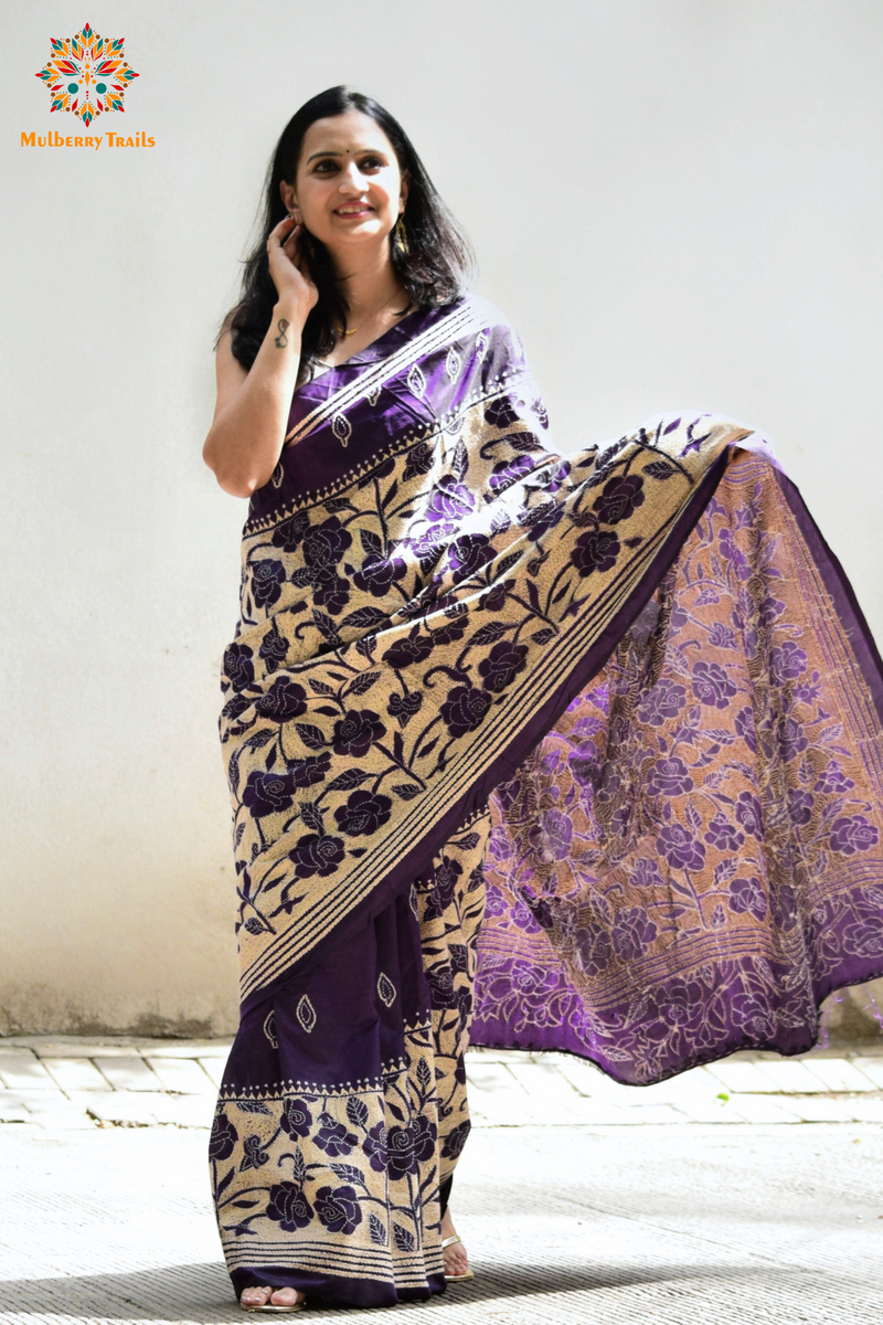 Art Silk saree with intricate Kantha embroidery featuring delicate floral and geometric patterns. The saree has a smooth, lightweight texture with vibrant threads that highlight the traditional hand-embroidery, adding a touch of elegance and cultural charm. Ideal for festive occasions, celebrations, or as a statement piece for special events.