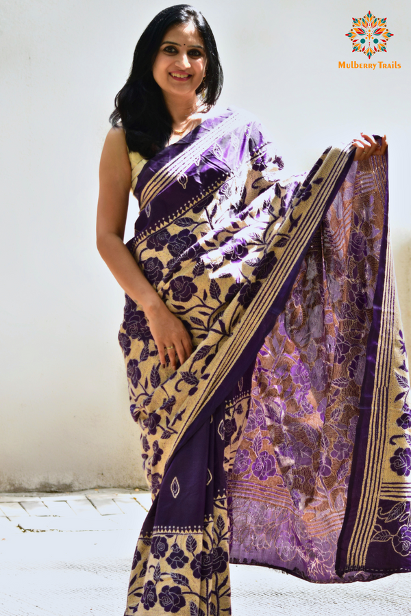 Art Silk saree with intricate Kantha embroidery featuring delicate floral and geometric patterns. The saree has a smooth, lightweight texture with vibrant threads that highlight the traditional hand-embroidery, adding a touch of elegance and cultural charm. Ideal for festive occasions, celebrations, or as a statement piece for special events.