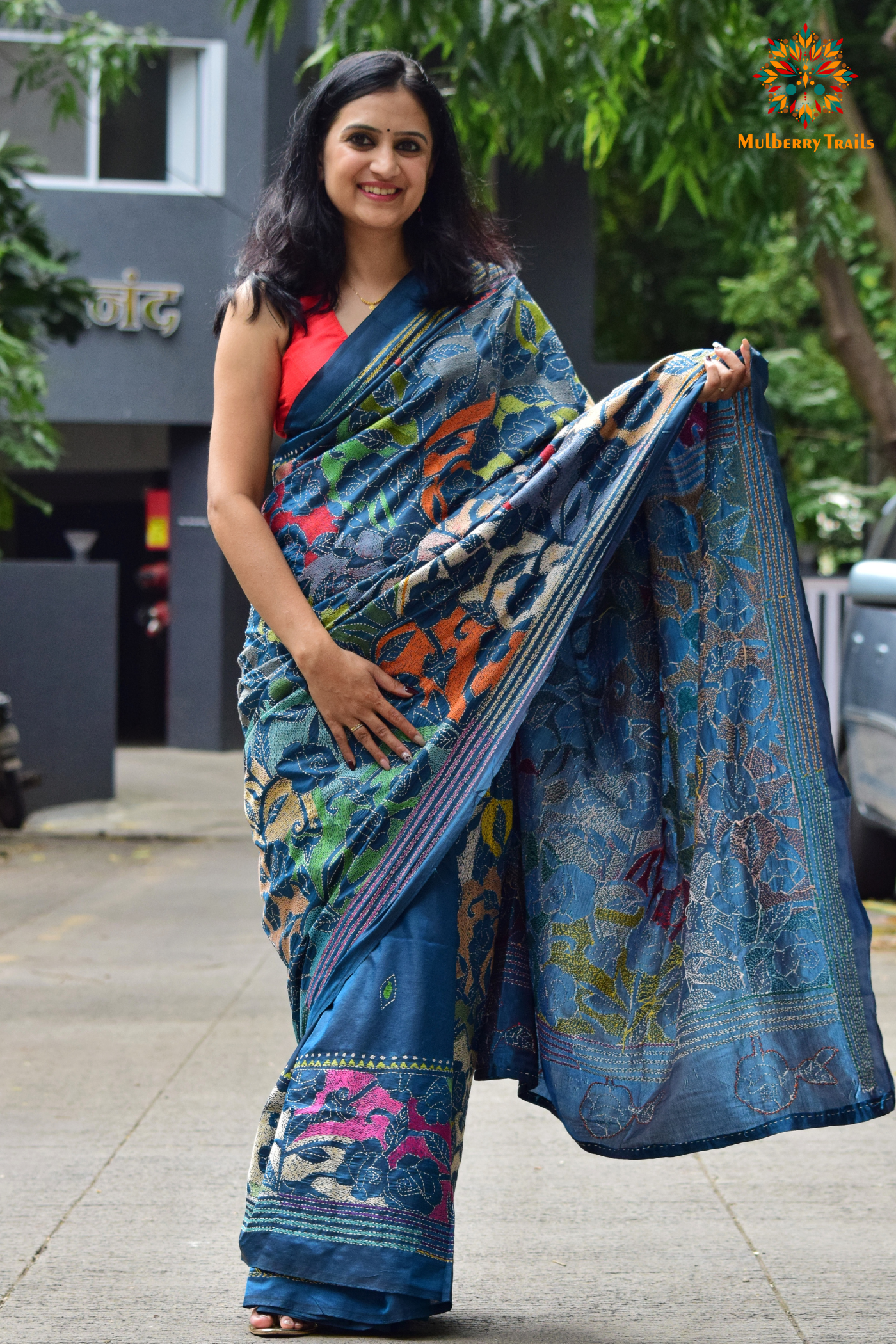 Art Silk saree with intricate Kantha embroidery featuring delicate floral and geometric patterns. The saree has a smooth, lightweight texture with vibrant threads that highlight the traditional hand-embroidery, adding a touch of elegance and cultural charm. Ideal for festive occasions, celebrations, or as a statement piece for special events.