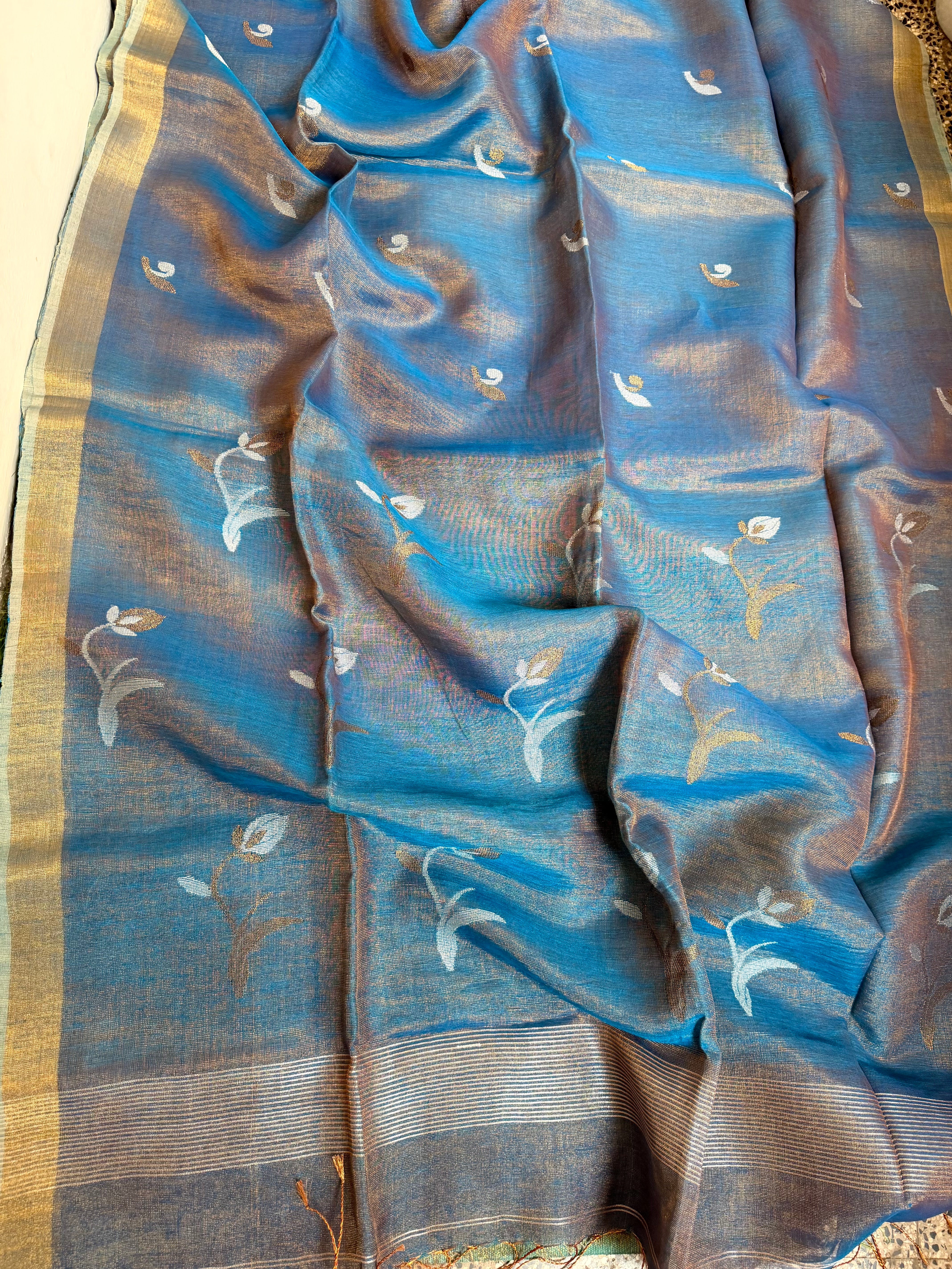 Linen tissue sarees with lotus motif