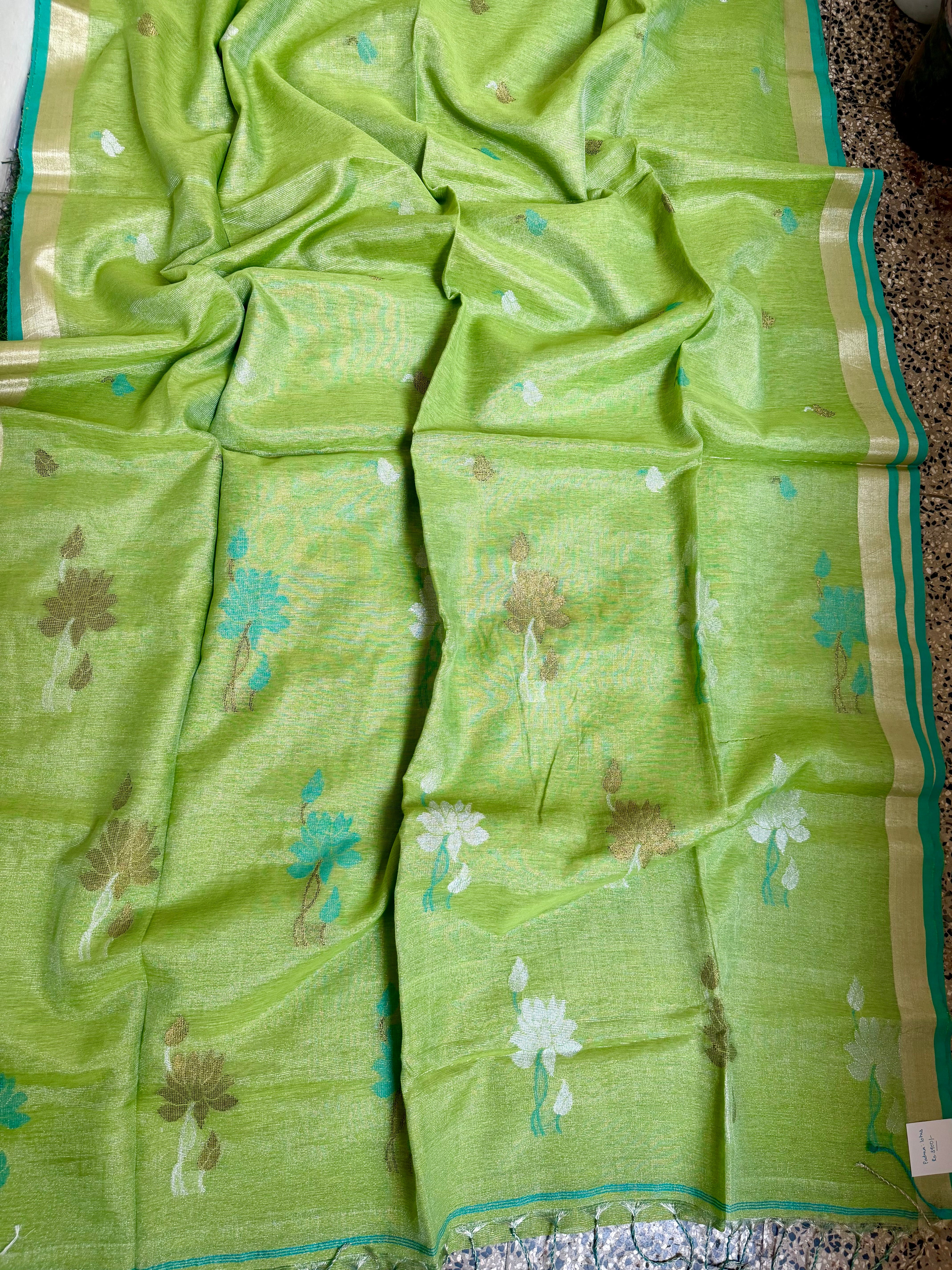 Linen tissue sarees with lotus motif